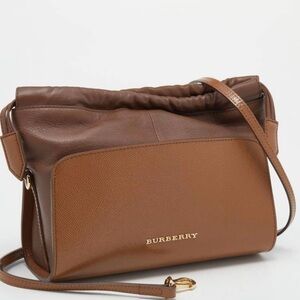 BURBERRY PATENT LEATHER DRAWSTRING CROSSBODY BAG